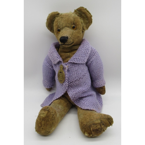 52 - Chad Valley c. 1920s straw filled teddy bear with glass eyes, jointed arms and legs and swivel head,... 