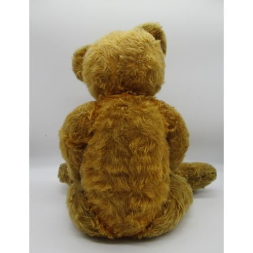 68 - Chad Valley c. 1930s teddy bear in golden mohair, with glass eyes, jointed arms and legs, swivel hea... 