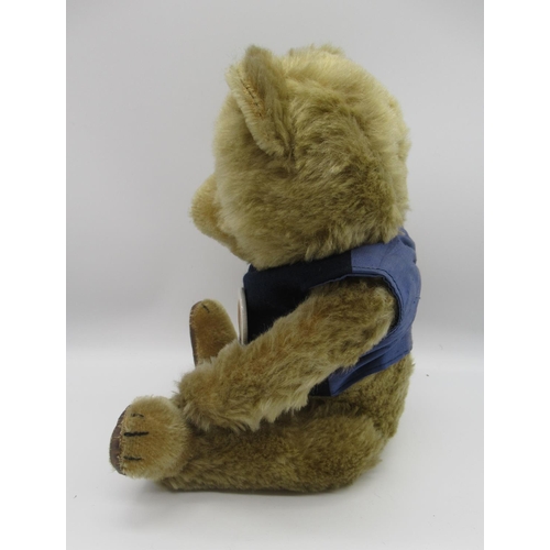 112 - Circa 1950's Chiltern working jingling teddy bear, in original condition, in golden mohair, with gla... 