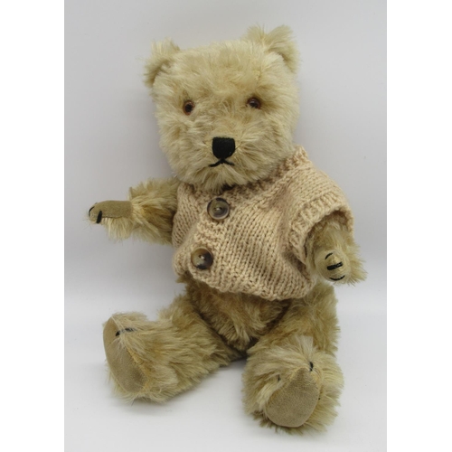 111 - Chiltern Hugmee small teddy bear in blonde mohair, with working squeaker, glass eyes, jointed arms a... 