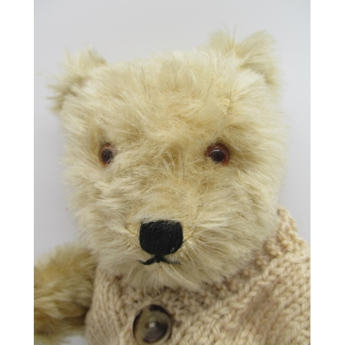 111 - Chiltern Hugmee small teddy bear in blonde mohair, with working squeaker, glass eyes, jointed arms a... 