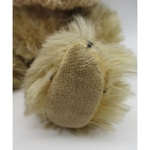 111 - Chiltern Hugmee small teddy bear in blonde mohair, with working squeaker, glass eyes, jointed arms a... 