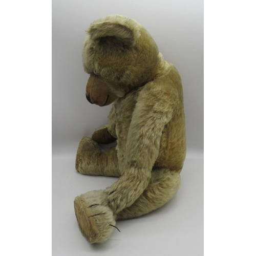 5 - Chiltern c. 1930's Hugmee teddy bear in blonde mohair, with glass eyes, jointed arms and legs and sw... 