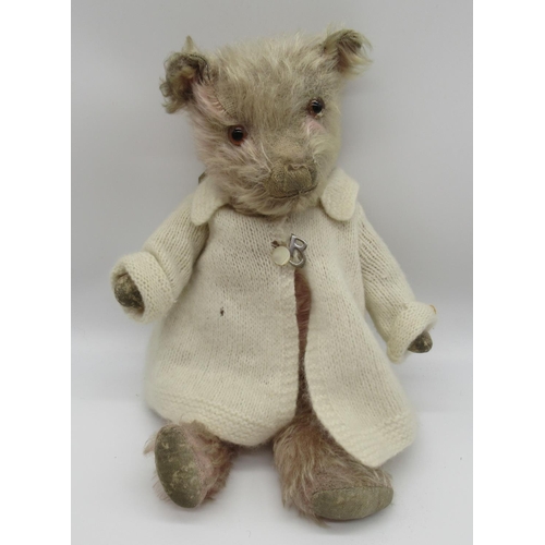 61 - Chiltern c. 1930s teddy bear in pink mohair with glass eyes, swivel head, jointed arms and legs, wea... 