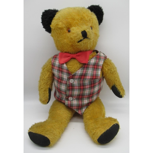 49 - Circa 1940/50's Sooty teddy bear with all original features, wearing a checked waistcoat and red bow... 