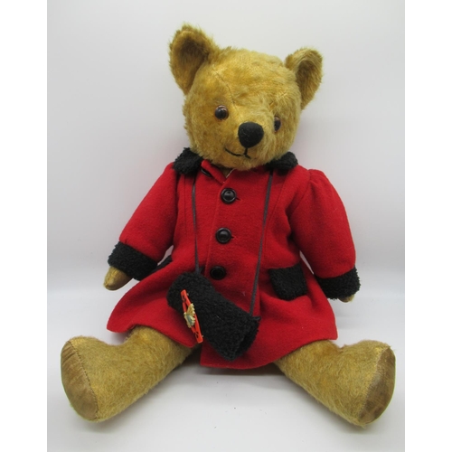 107 - Circa 1950's Pedigree teddy bear in golden mohair, with glass eyes, jointed arms and legs, swivel he... 