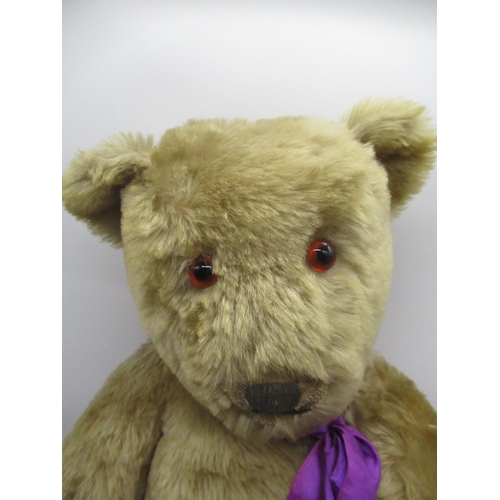 62 - Large c. 1940's Chiltern teddy bear in blonde mohair, with glass eyes and wire jointed arms and legs... 