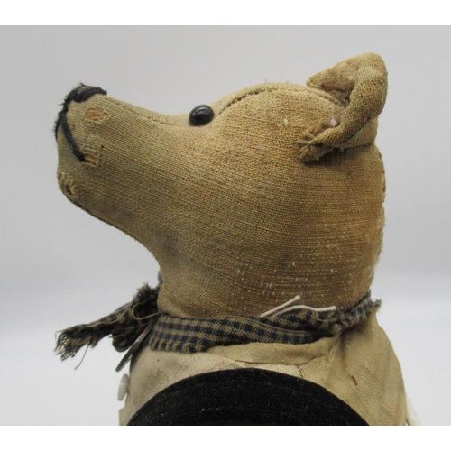 131 - C. 1920's French teddy bear with boot button eyes, a silent growler, swivel head and jointed arms an... 