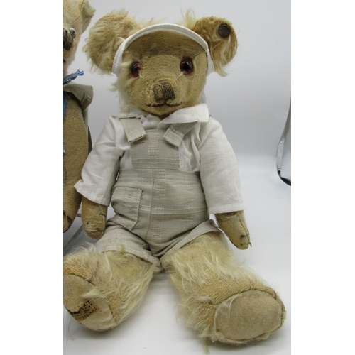 71 - Merrythought c. 1930's teddy bear dressed in original tennis outfit and cap, with glass eyes, button... 