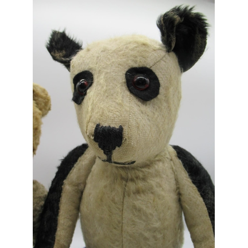 42 - Chiltern c. 1930's musical panda with wind up mechanism that plays 'Go To Sleep Lullaby,' H43cm and ... 