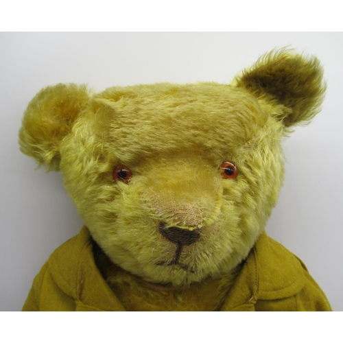 142 - Circa 1920's American bear in golden mohair with glass eyes, jointed arms and legs, swivel head, sti... 