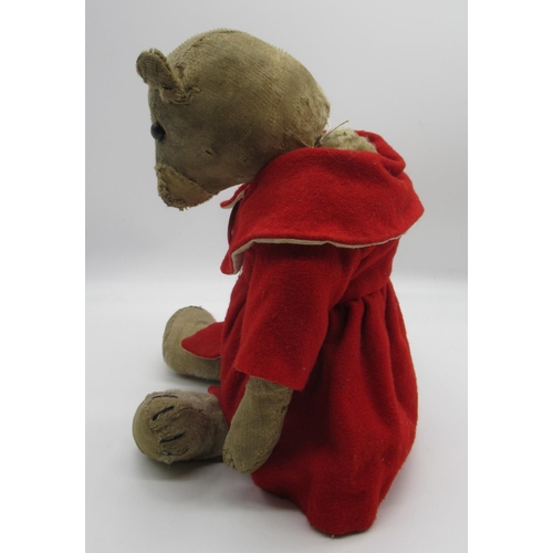144 - C20th American bear with boot button eyes stitch nose and mouth and hump wearing a pair of white tro... 