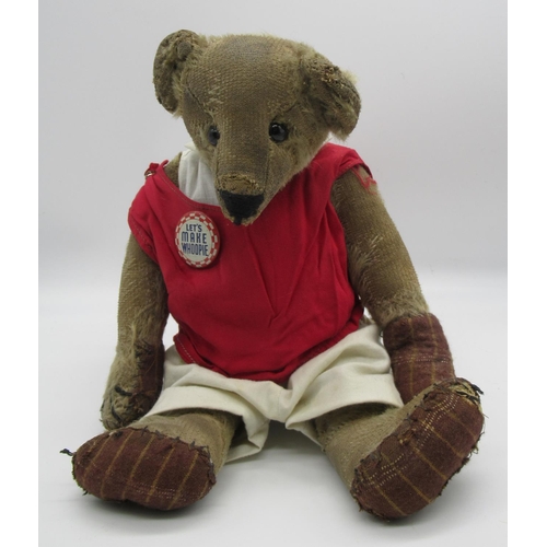 144 - C20th American bear with boot button eyes stitch nose and mouth and hump wearing a pair of white tro... 