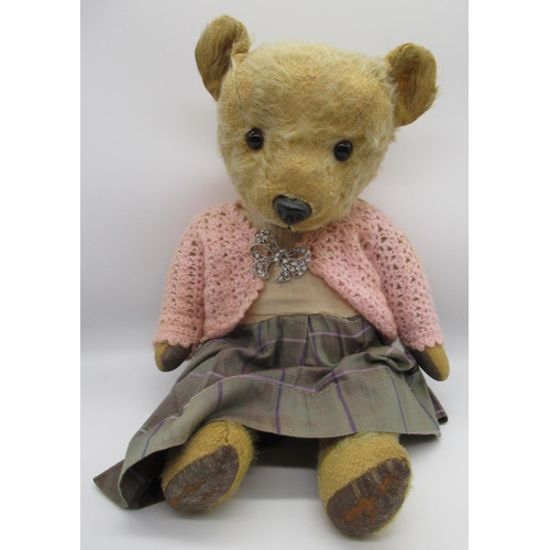 109 - Chiltern c. 1940/50's teddy bear in golden mohair, with glass eyes, jointed arms and legs, swivel he... 