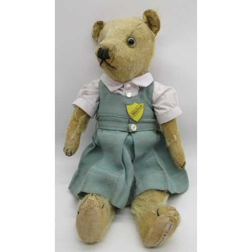 116 - Chiltern c. 1930's School Boy teddy bear with glass eyes, jointed arms and legs and swivel head, wea... 