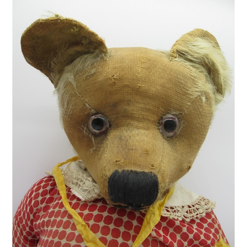 161 - Circa 1930's teddy bear, possibly W. J Terry, straw stuffed with original clear glass eyes with pain... 