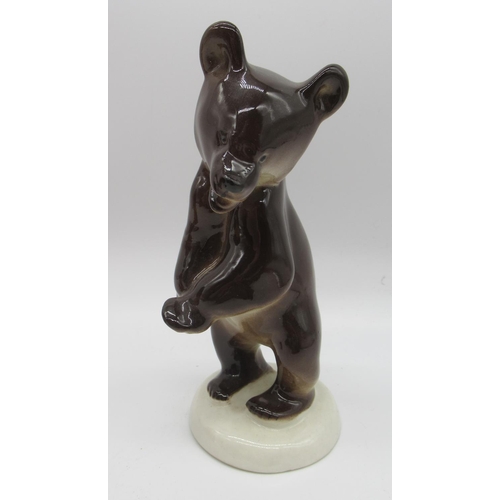 246 - Performing brown bear standing on cylinder, stamped with makers mark and stamped Made In USSR, brown... 