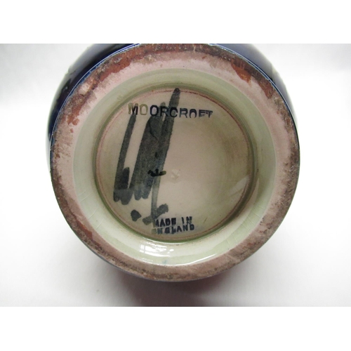 302 - Moorcroft mallet shaped vase decorated in Anemone pattern on a blue ground, impressed marks and gree... 