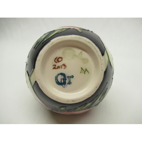 322 - Small Moorcroft squat vase decorated with white flowers on a blue ground, impressed and painted mark... 