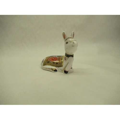 331 - Royal Crown Derby Paperweights - Lioness L18cm and Donkey Foal H10cm, both with gold stoppers (2)