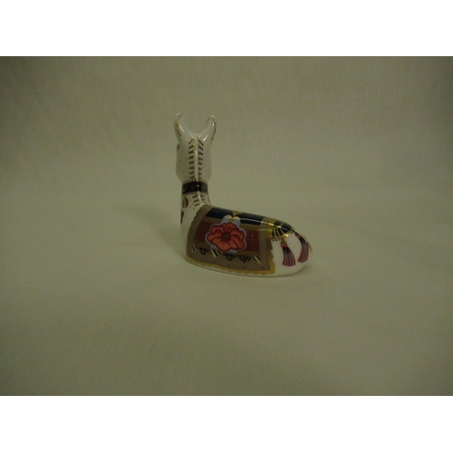 331 - Royal Crown Derby Paperweights - Lioness L18cm and Donkey Foal H10cm, both with gold stoppers (2)