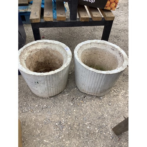 28 - Two concrete planters