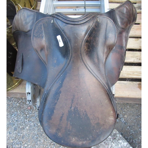 26 - Brown and black leather saddle