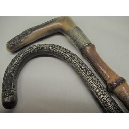 283 - C20th bamboo walking cane with white metal handle and metal ferrule L86cm another similar with horn ... 
