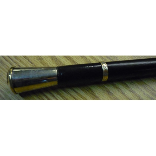 817 - Ebonised swagger cane with badge for the army catering corps