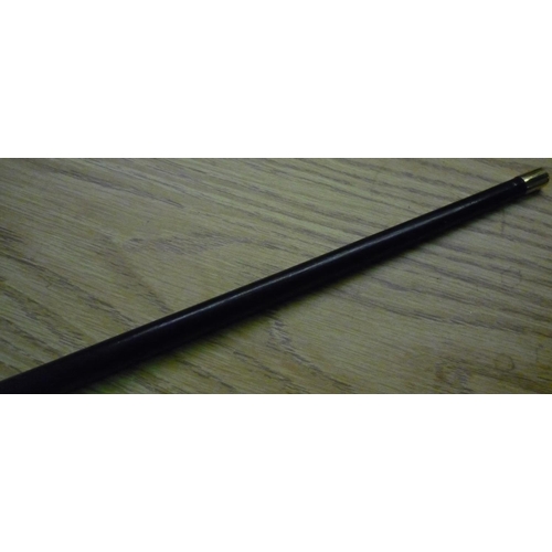 817 - Ebonised swagger cane with badge for the army catering corps