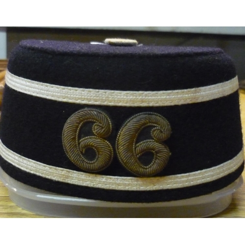 821 - Military regimental pill box hat embroidered with number 66, complete with badge to the front and le... 