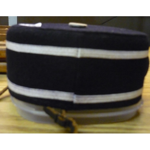 821 - Military regimental pill box hat embroidered with number 66, complete with badge to the front and le... 