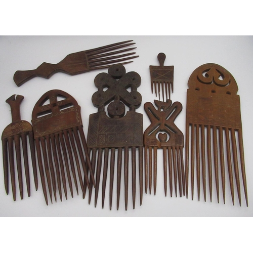 781 - Collection of seven various carved wood African native combs