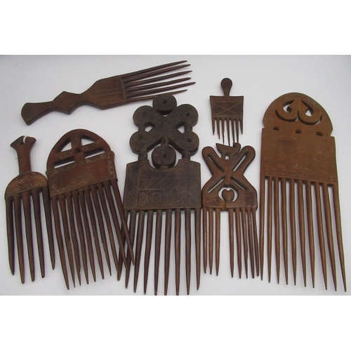 781 - Collection of seven various carved wood African native combs