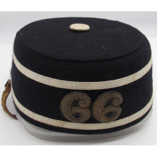 821 - Military regimental pill box hat embroidered with number 66, complete with badge to the front and le... 