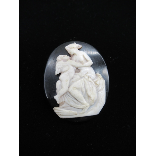 31 - Cameo brooch mounted on Whitby Jet, a classic cameo brooch and another brooch with portrait