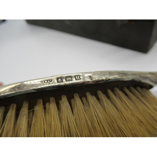 37 - Hallmarked Sterling silver dressing table cased set of a hair brush and hand mirror (missing mirror)... 