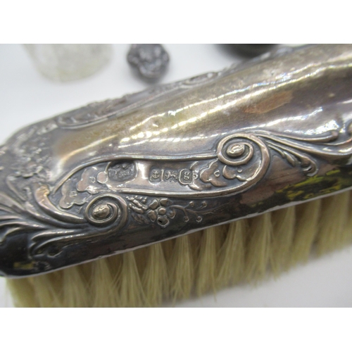 41 - Hallmarked Sterling silver dressing table set of two brushes, a Hallmarked Sterling silver hand mirr... 