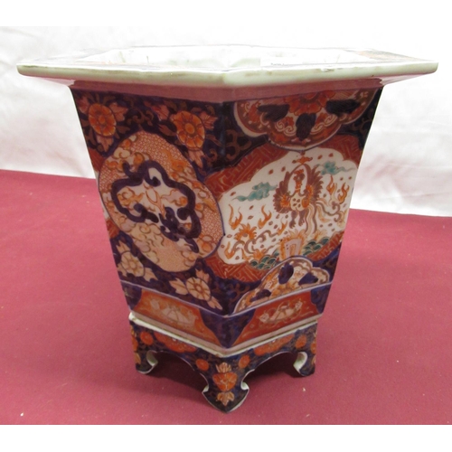 101 - C20th Chinese Imari pattern planter and stand, hexagonal tapering form H24cm W26.5cm