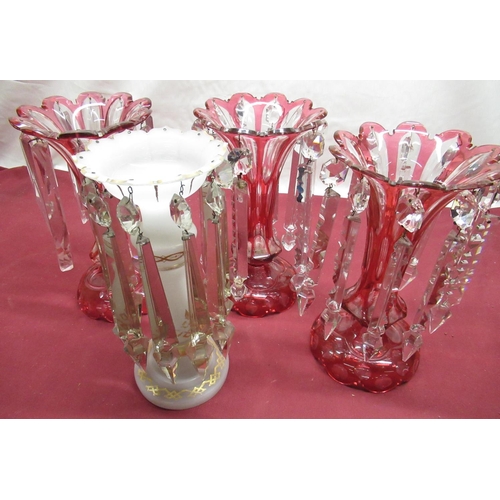 136 - Three C19th Bohemian ruby overlaid lusters with faceted prismatic drops H29cm, late C19th opaque gla... 