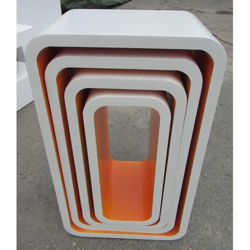 58 - Craig Revel Horwood Collection - graduated set of four white and orange curved rectangular wall shel... 
