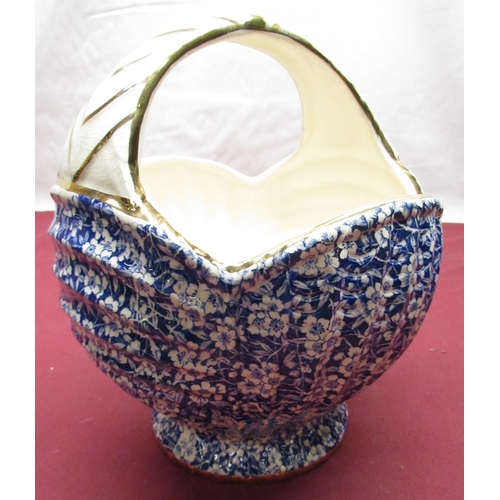 153 - Six pieces of black Carlton Ware with apple blossom design including vases, water jug etc, an Arthur... 