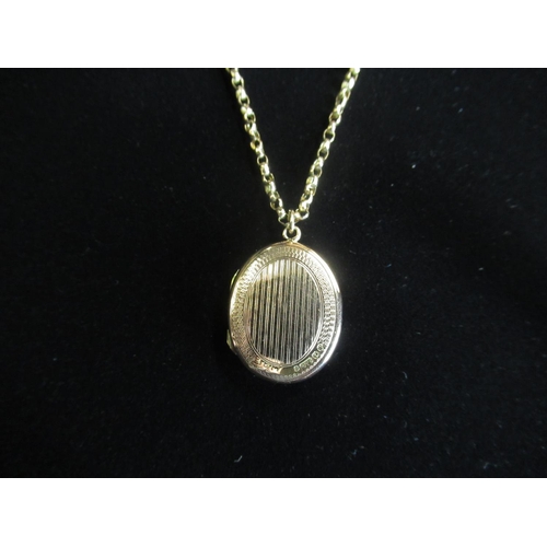 32 - Hallmarked 9ct rose gold locket stamped 375, Birmingham on 9ct gold belcher chain necklace with tube... 