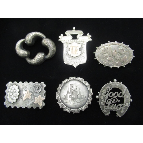 41 - Collection of hallmarked Sterling silver brooches including Howden Church, etched, ebossed and brigh... 