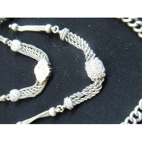 42 - Hallmarked sterling silver albert chain 0.9oz and a matching pair of unmarked silver tassles