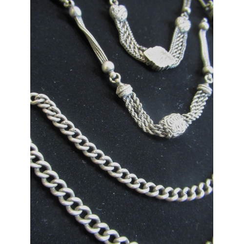 42 - Hallmarked sterling silver albert chain 0.9oz and a matching pair of unmarked silver tassles