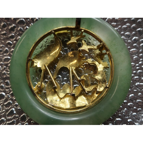 85 - C20th Chinese circular jade pendant with inset gold plated open work study of storks with two mounte... 