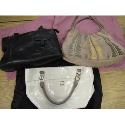 228 - Radley black leather ladies handbag complete with dust cover, Radley light tan ladies handbag with t... 