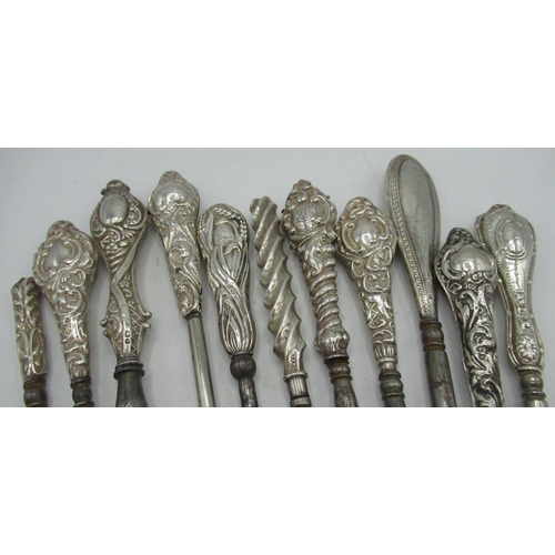 96 - Collection of eleven Victorian and later hallmarked silver button hooks,