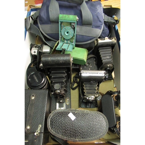 138 - Collection of various camera equipment including Minolta 404SI, with 28-80 lens and a Minolta 75-300... 